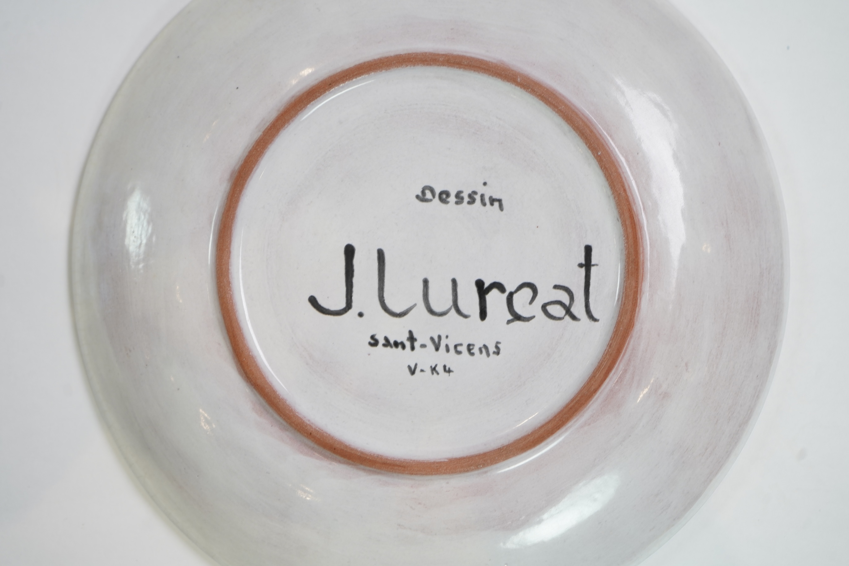 Jean Lurçat (1892-1966): A white glazed earthenware plate, decorated with a central stylised cockerel